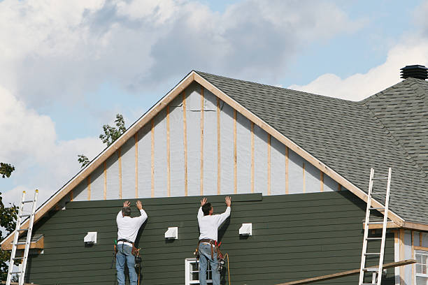 Professional Emergency Siding Repair technician working in Windsor, CO
